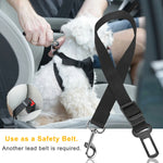 Black pet dog seat belt leash with metal clip being fastened on car seat