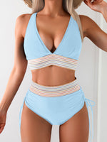 Women’s deep V-neck bikini set in light blue with multicolor striped waist band and side ties