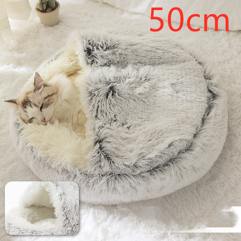 Light grey round plush pet bed with shag hood, cat resting and sleeping.