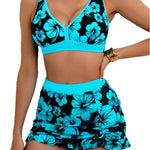 Blue and black floral bikini top with ruffled swim skirt and high-rise bottoms