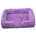 Lavender plush round dog bed with cushioned bolsters and inner mat