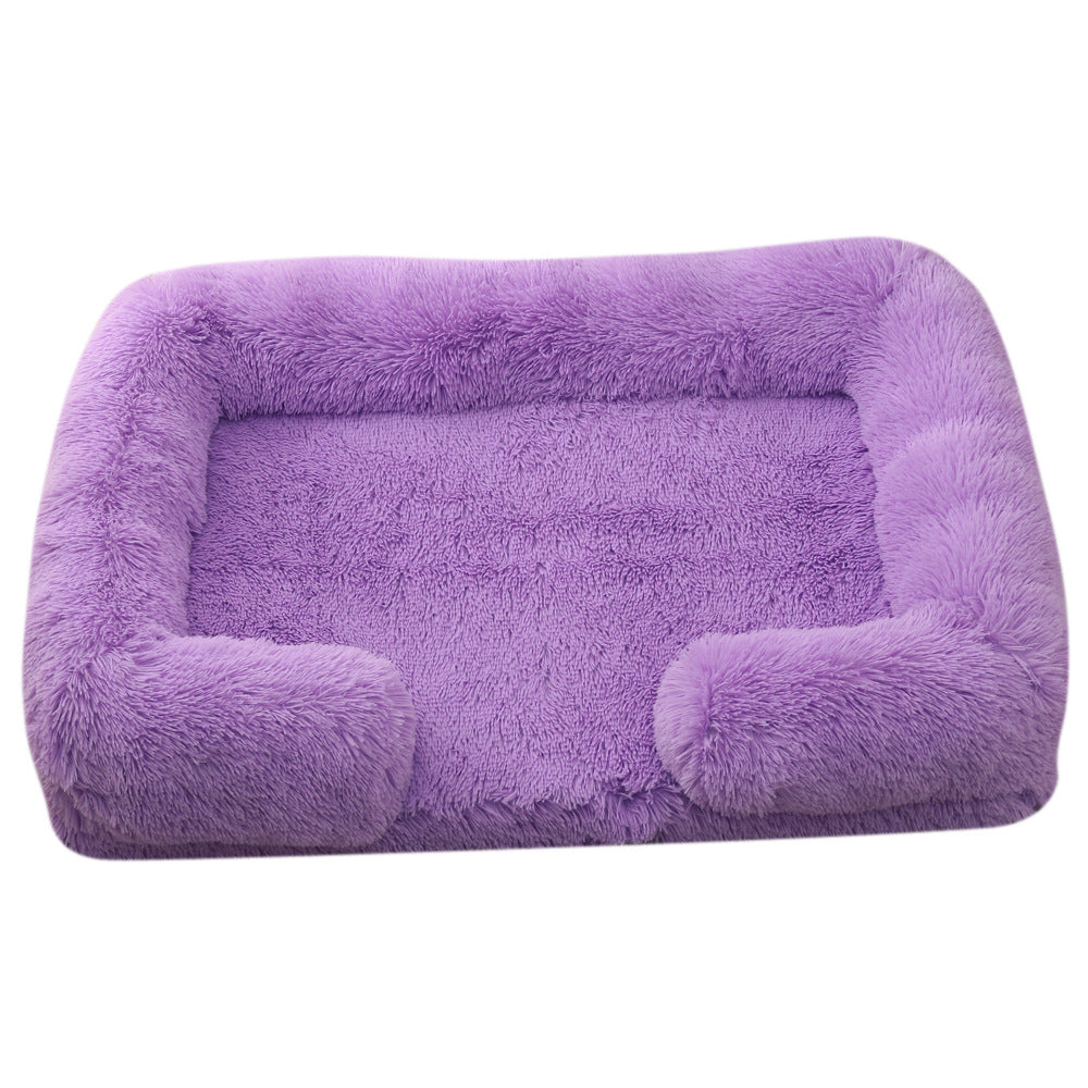 Lavender plush round dog bed with cushioned bolsters and inner mat