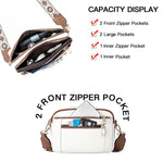 White crossbody bag with patterned strap, gold hardware, and front zip pockets