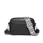Black small square leather crossbody bag with zip top and wide rhombus embroidered strap