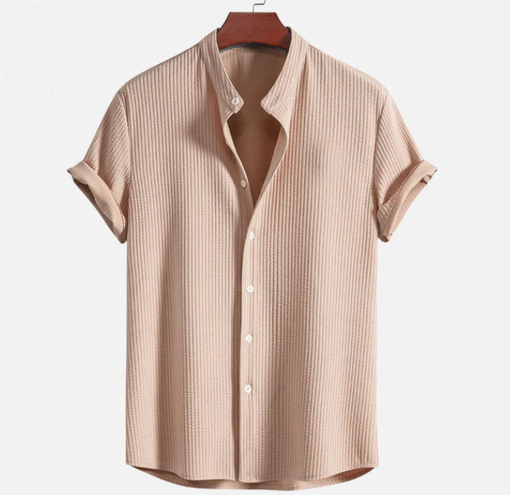 Light brown short sleeve button-up shirt with pointed collar and vertical textured fabric