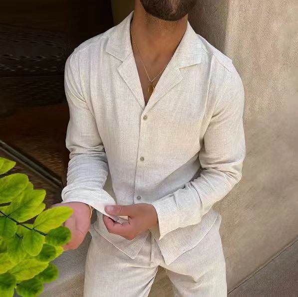 White long-sleeve lapel shirt and slim trousers set, front buttons and V neckline.