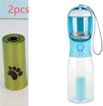 Turquoise dog water bottle with filter mesh and carrying strap, plus green poop bag roll (2 pcs)