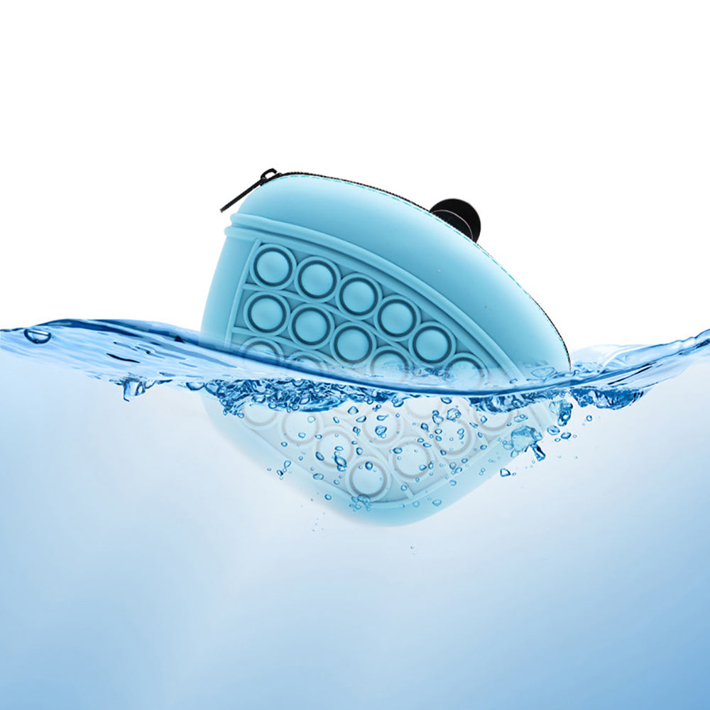 Blue silicone dog treat pouch with water beading on circular popper texture