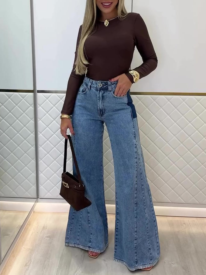 Light blue high-waisted flared jeans with front button and zip fly