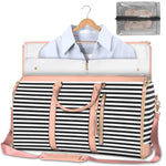 Striped black and white waterproof duffel bag with pink trim, open interior, shoulder strap