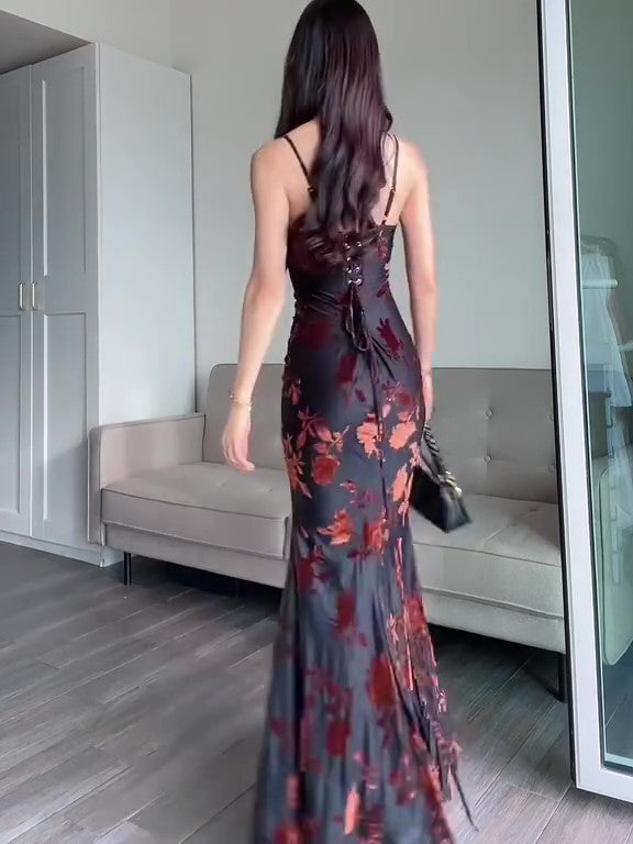Black floral maxi dress back view with spaghetti straps and tied shoulder details