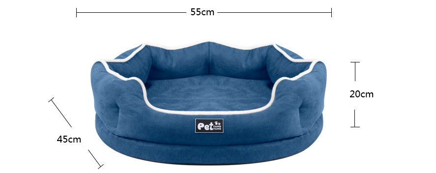 Blue round removable pet bed mattress with white piping and logo patch