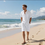 White linen short-sleeve shirt and matching shorts set with open collar and chest pocket