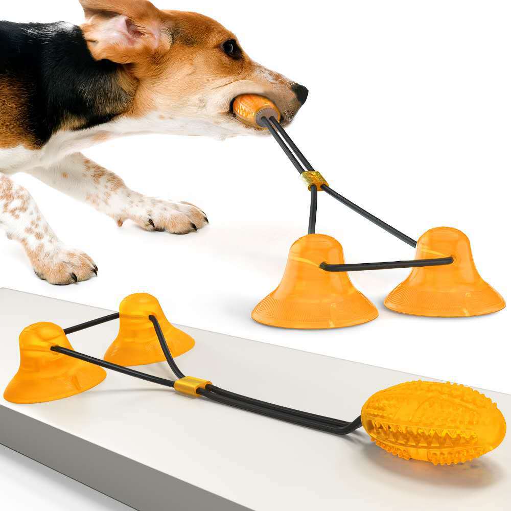 Orange suction cup tug toy with black cord and textured chew ball
