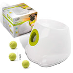 White ball launcher with lime-green ring and three yellow tennis balls