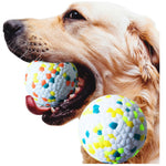 Dog chew ball with multicolor pattern and textured white surface