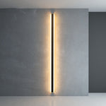 Minimalist LED wall lamp, long vertical acrylic light bar casting warm glow