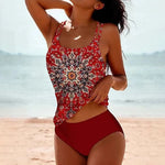 High-waist bikini swimsuit with red patterned tank top and dark red solid bottoms