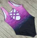 One-piece swimsuit, purple patterned front with criss-cross back strap cutout