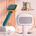 Pet grooming brush with stainless pins and massage teeth, teal and orange
