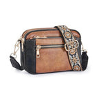 Brown and black colorblock crossbody bag with floral embroidered strap and zip compartments