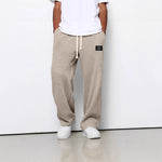 Waffle loose drawstring trousers in khaki/beige with straight, relaxed leg opening