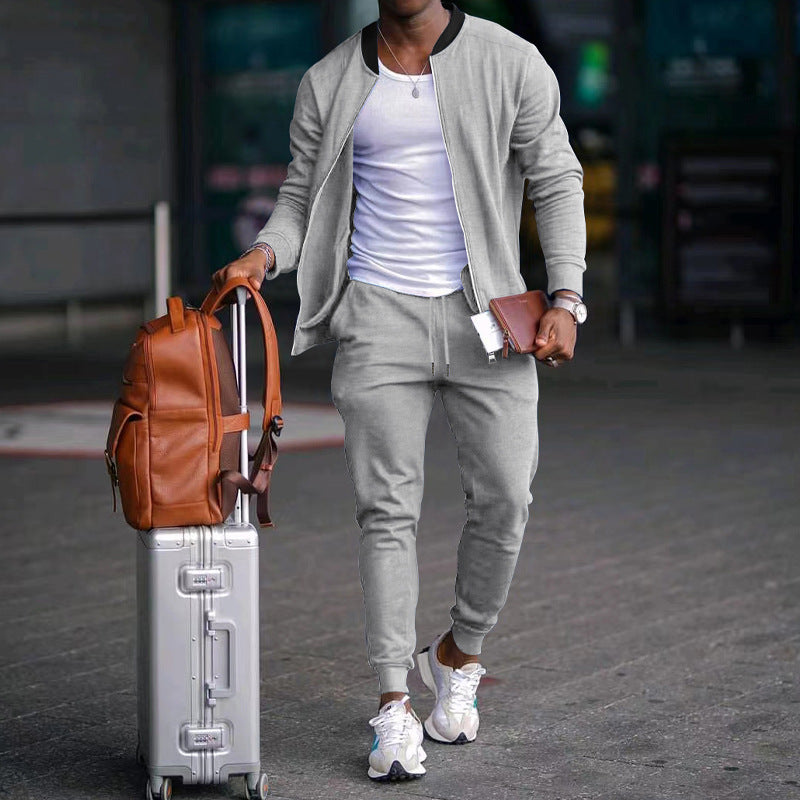 Men's zip-up long sleeve jacket and drawstring sweatpants set in light gray, tapered legs
