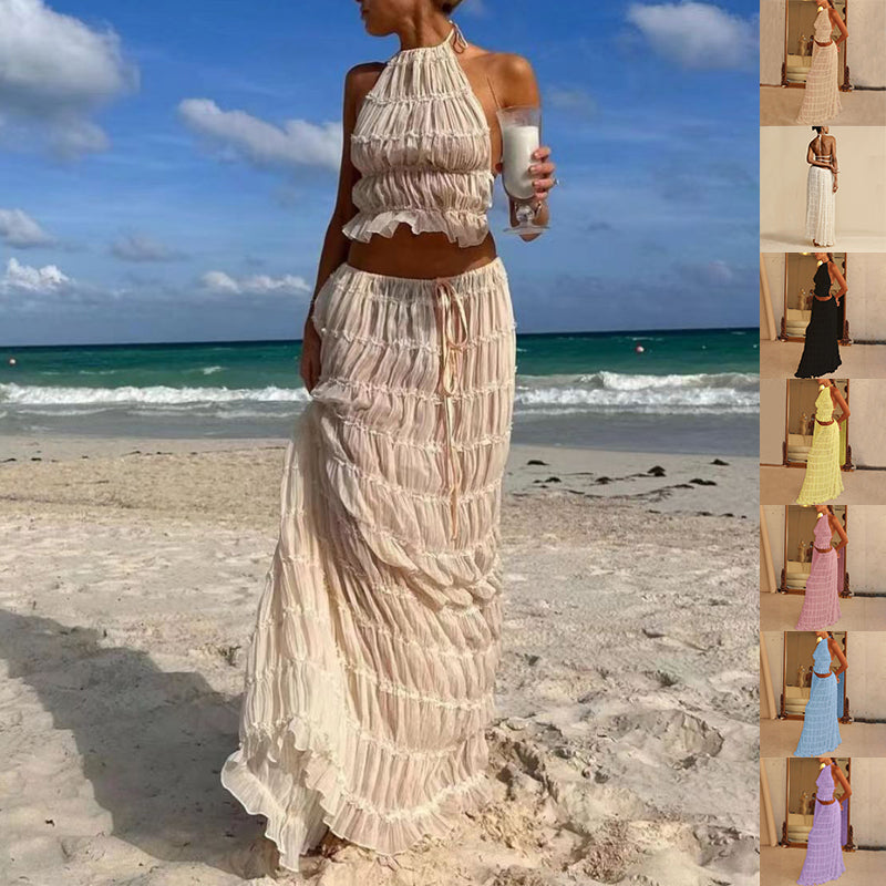 White halter crop top and tiered pleated maxi skirt set with ruffled edges