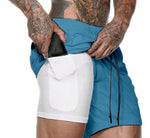 Blue pocket compression shorts with side phone holder pouch and drawstring cords