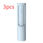 Reusable pet hair remover lint roller, self-cleaning cylindrical brush in light blue.
