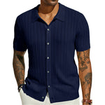 Dark blue knitted polo shirt with point collar, short sleeves, button placket