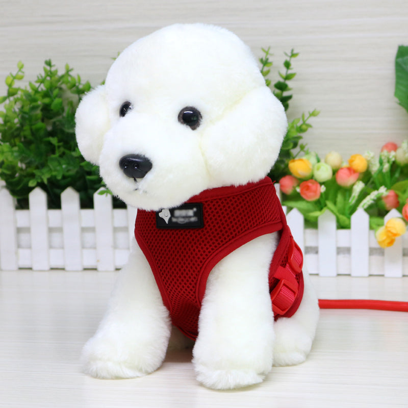 Dog wearing red mesh harness with circular chest opening and black label