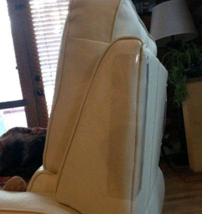 Anti-scratch sofa guard pad: clear protector panel on a beige seat back/arm area