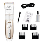 Pet hair clipper kit in white and gold with charging cable, oil bottle, and comb guards