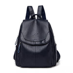 Women's PU leather travel backpack with front flap and adjustable straps, dark blue