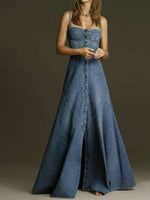 Denim suspender dress with sleeveless straps and long flared skirt with button front