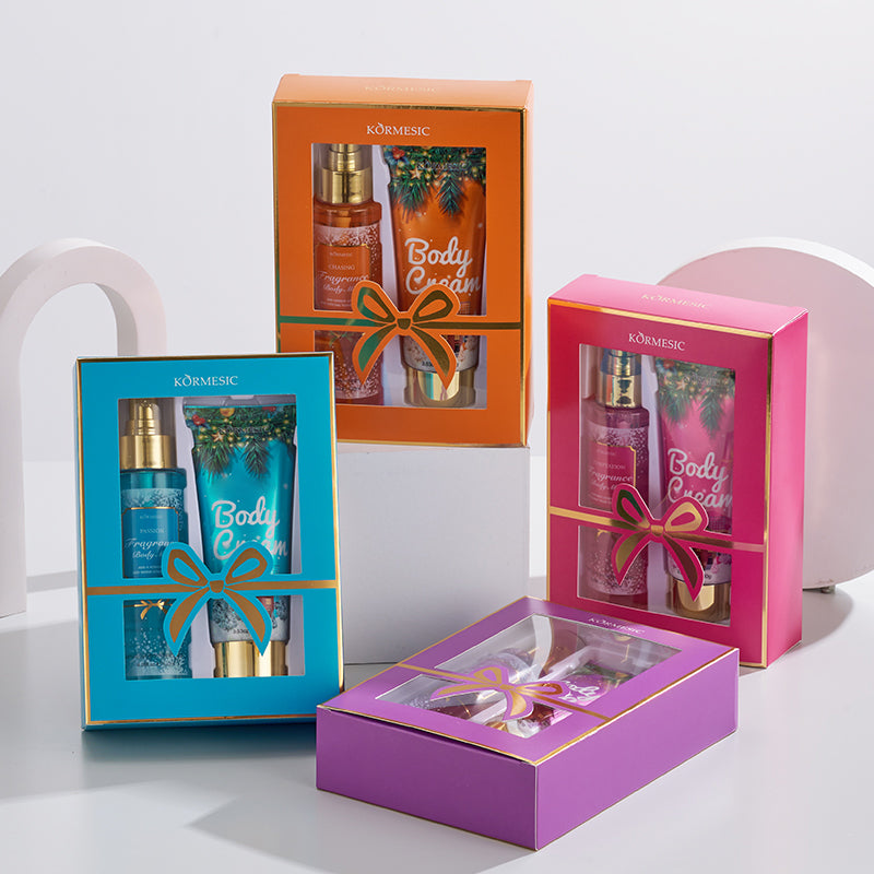 KORMESIC body cream gift set with orange and pink boxed bottles and tubes