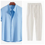 Light blue short sleeve button-up shirt with white drawstring pants