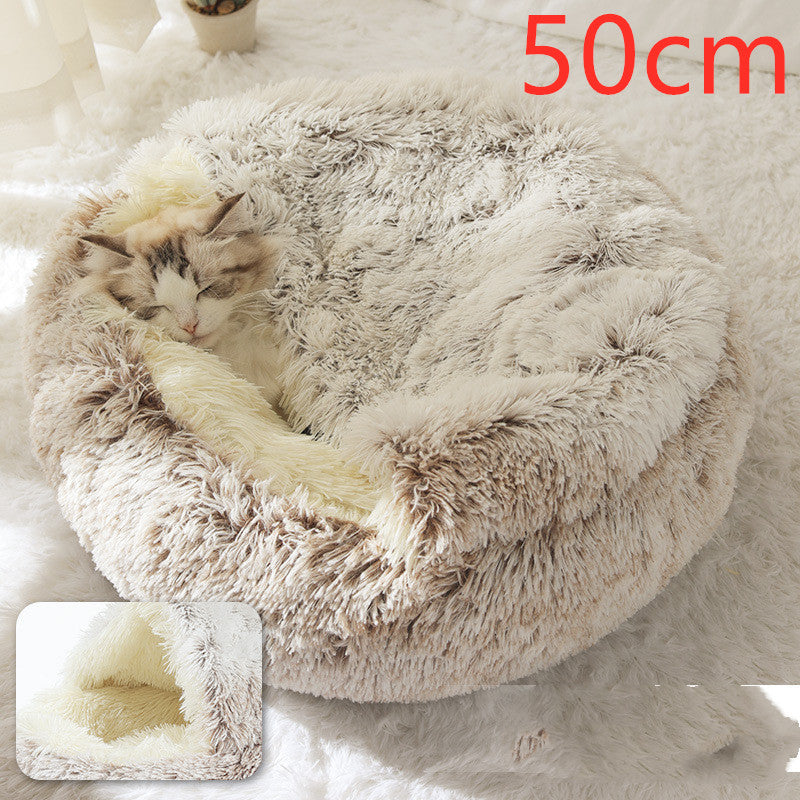 Round tan shag plush pet bed with pet curled inside