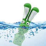 Green latex rabbit squeaky chew toy floating with water droplets around it