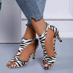 Zebra-print high-heel open-toe sandals with fish-mouth cutout and ankle strap
