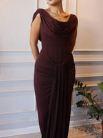 Sleeveless maxi dress with draped cowl neckline and ruched waist with tied sash