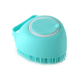 Blue-green silicone pet bath massage brush with round pad and short rubber bristles