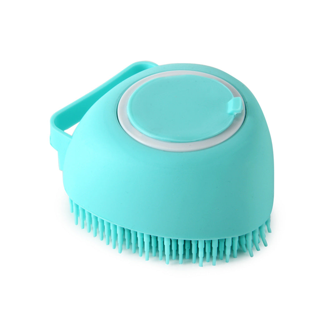 Blue-green silicone pet bath massage brush with round pad and short rubber bristles