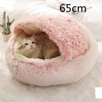 Round plush pet bed, pink 65cm, with a cat curled inside