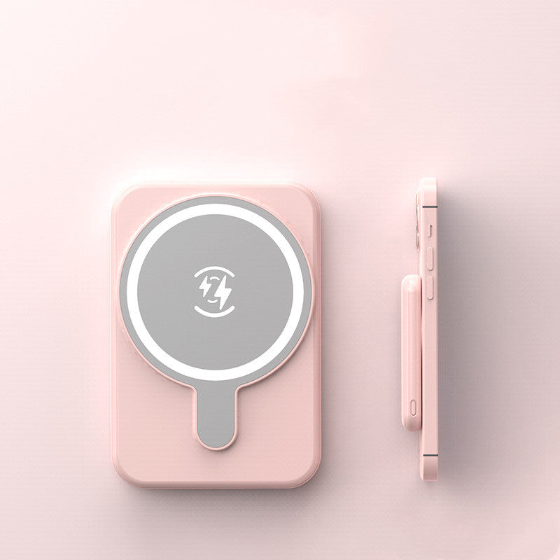 Pink mini magnetic wireless power bank with charging icon, front view and side edge
