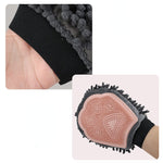 2-in-1 pet grooming glove with pink silicone nubs and black wrist strap