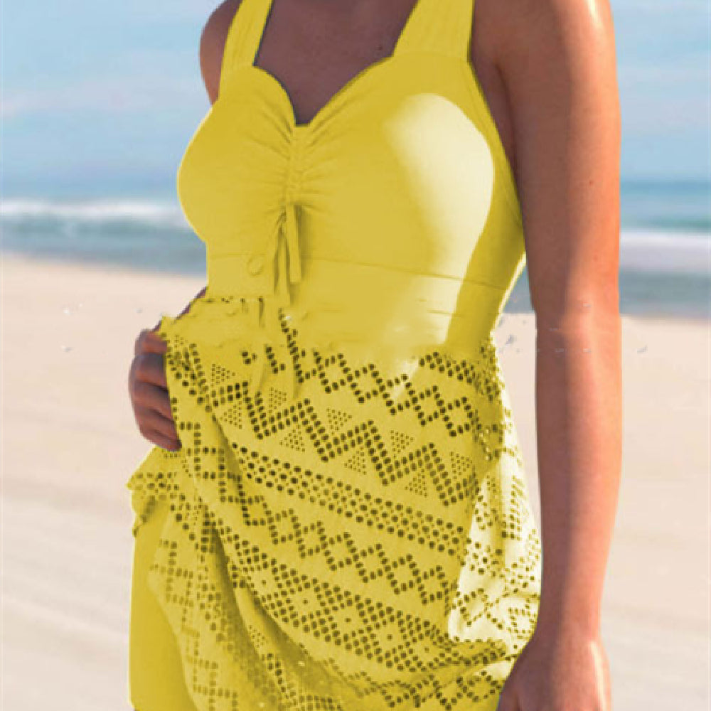 Yellow lace one-piece swimsuit with padded cups, tie-front detail, and patterned lace skirt