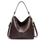Dark brown hobo bucket bag with zipper top and adjustable shoulder straps