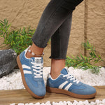 Women's casual sneakers in light blue with white stripes, lace-up, gum outsole